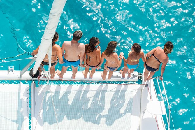 Be Happy - Private Catamaran Cruise Sint Maarten Full Day Tour - Grand Case Beach: French-side energy and Creole Rock exploration time