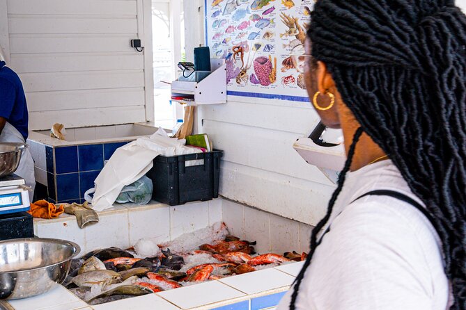 Cultural Food Tour in Marigot, Saint-Martin by ISLAND FRIEND - Stop 4: Guavaberry Colombier Tradition and the island’s signature fruit