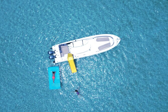 Full Day Anguilla Private Charter Tour - Pierre at the helm: smooth ride, smarter stop choices