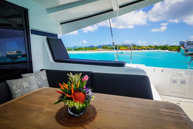 Luxury Catamaran Private Charter in St. Maarten/St. Martin - Stop 3: The Spa at Belmond La Samanna area (Baie Longue)—cliffs, clear water, and a change of scenery