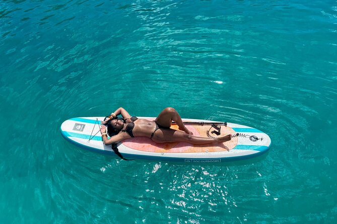 Mojito - Full Day Private Catamaran Cruise - Sint Maarten - On board perks: drinks, snacks, snorkeling gear, and that floating mat moment