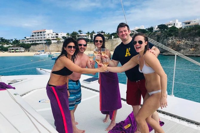 No1SXM Day Sailing Experience in St. Maarten - Food and drinks onboard: sandwiches, rum punch, and real sailing energy