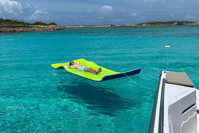 Private Charter Tour on Noali Axopar 37 Around St. Martin - Pinel Island: calm-water swims, iguanas, and an easy lunch option