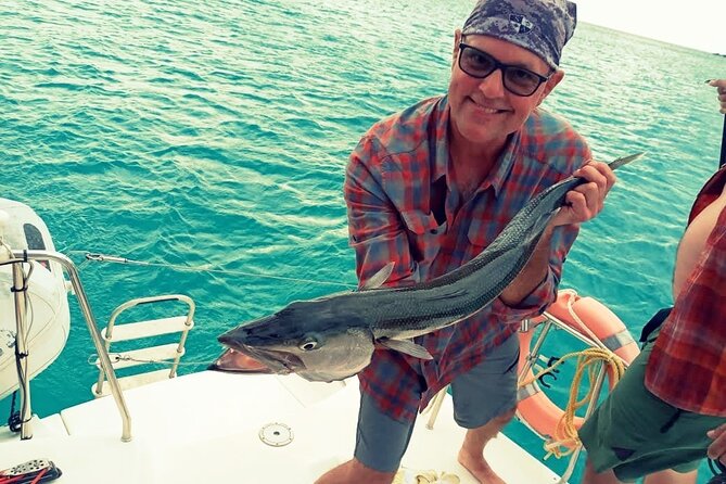 Private Full-Day Luxury Sailing Catamaran Charter in Sint Maarten - Second snorkel and snack rounds: melon, drinks, and more time in the water