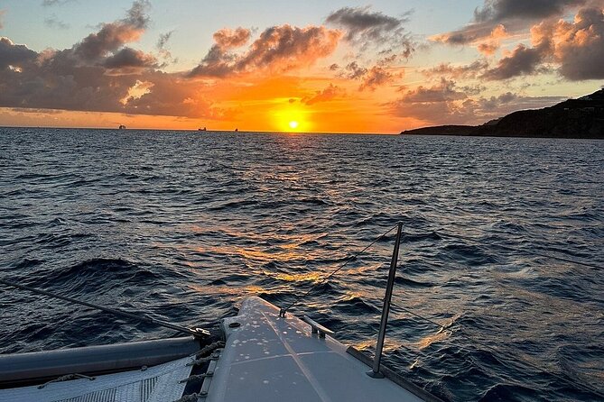 Private Full-Day Luxury Sailing Catamaran Charter in Sint Maarten - Little Bay: shipwreck, submarine, and helicopter scenery