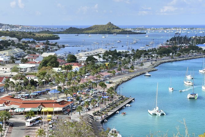 St-Martin and St Maarten: Sightseeing Tour of the French and Dutch Sides of the Island - Getting There: Pickup, the EDC Lot, and the One Timing Trap