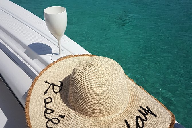 Sunset in Saint Maarten - What You Get on Board: Rosé, Soda, Snorkel Gear, and Paddle Board