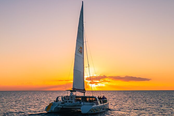 Tango Caribbean Dinner Cruise - Boarding the Tango catamaran: shoes off, casual dress, and space to spread out