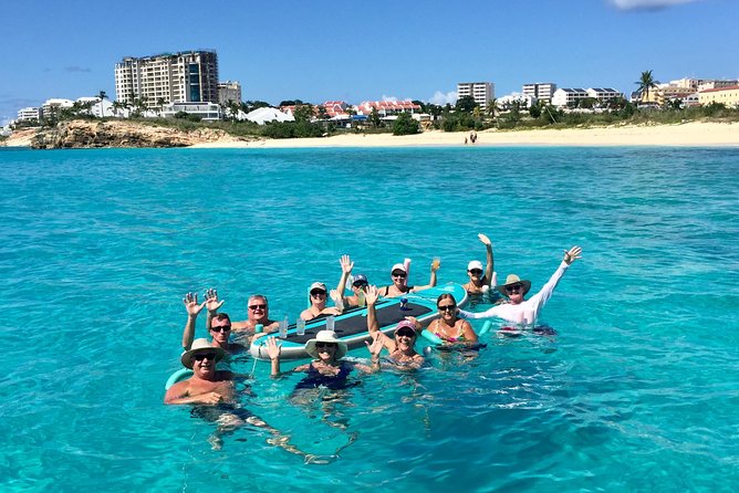 The Best Catamaran Day Sail in St Maarten - Mullet Bay stop: snorkeling, paddleboarding, lunch, and swing anticipation
